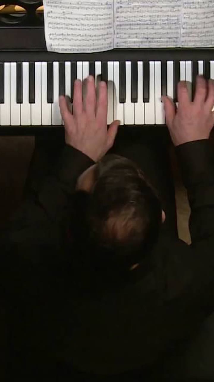 Pierre-Laurent Aimard at the piano, filmed from above, playing Ligeti
